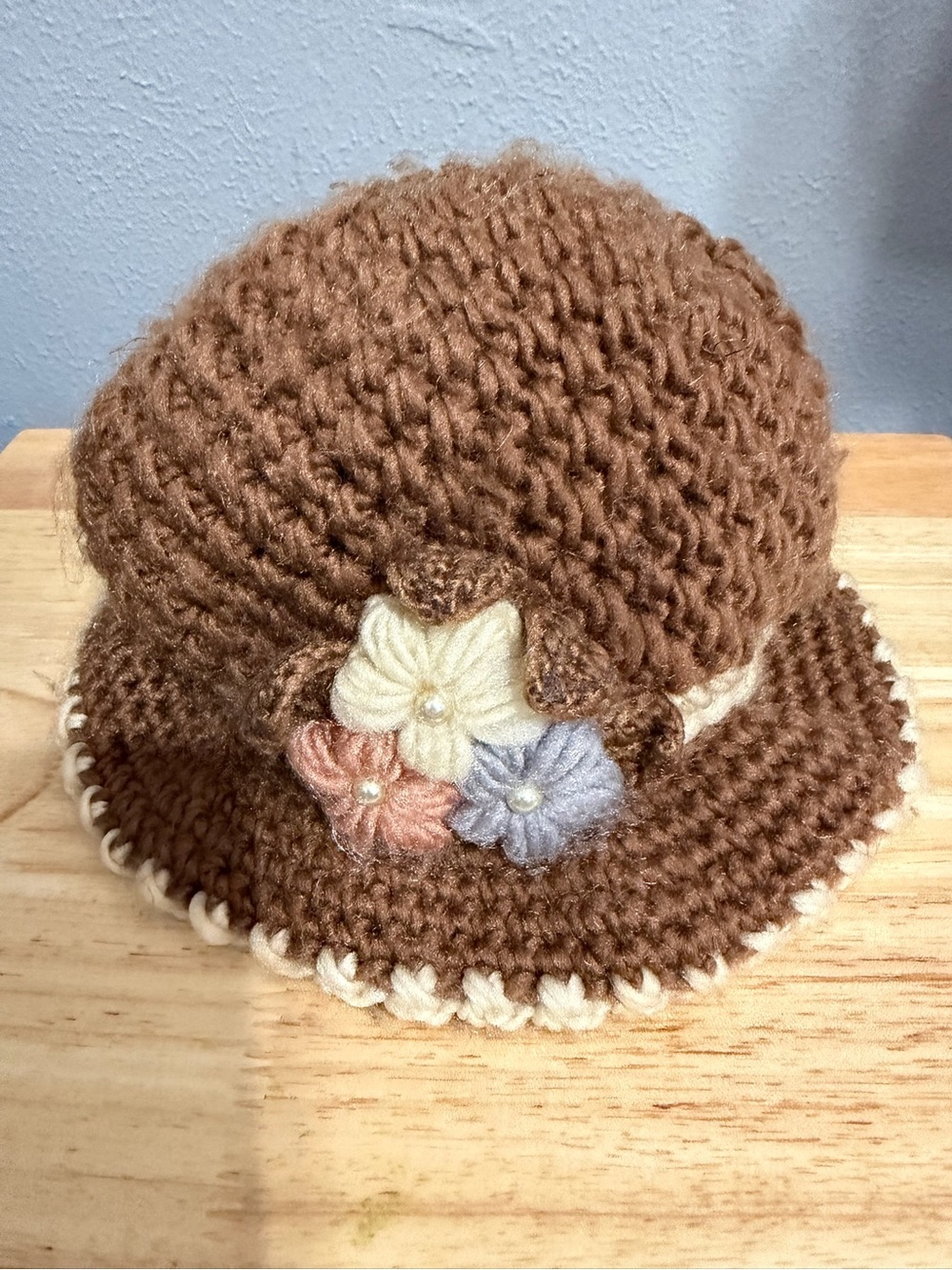 Cozy Brown polyester Knit Hat with Flower Trim and fleece lining